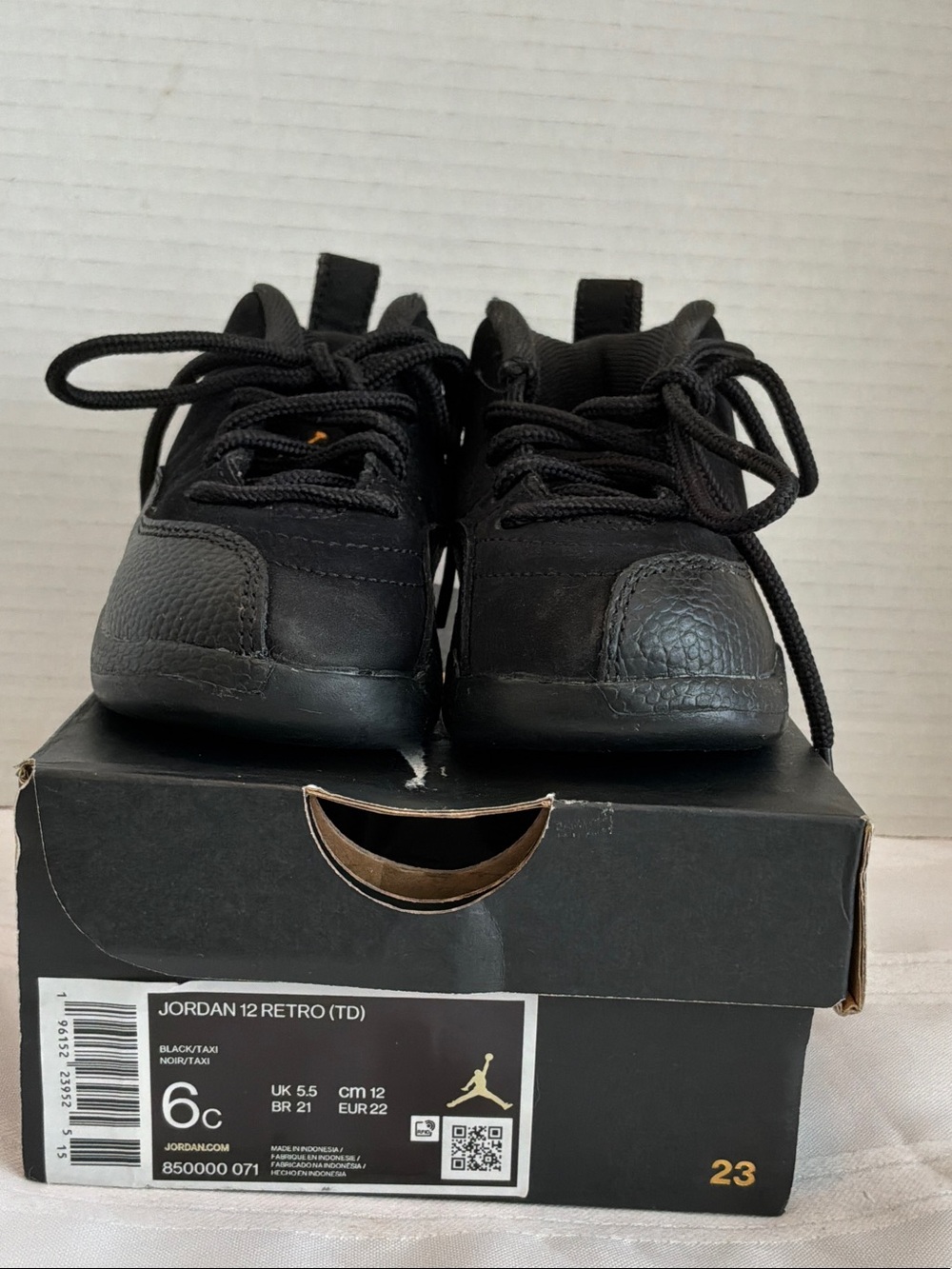 Jordan Kids Black Retro 12 Sneakers size 6c with gold sticker with box